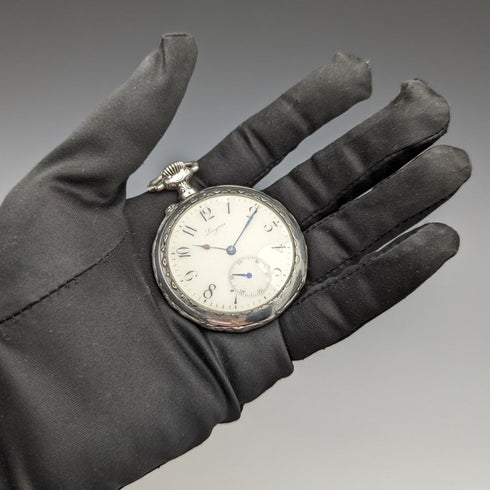 Around 1906 Antique Longines pocket watch silver side open face works well